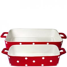 two red and white ceramic baking dishes with polka dots on the bottom, one is holding a