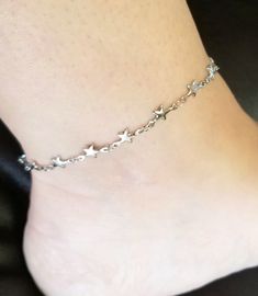 New Handmade  Silver Star Ankle Bracelet ☆ Beautiful stainless steel Star Anklet ☆ Stars go all the way around the ankle ☆ Anklet is available  in multiple lengths plus has a 2 inch extension ☆ Hypoallergenic ☆ Stainless steel will not tarnish Gift Packaging & Messages: Your item will be lovingly packaged and labeled as a handmade item.  Item's that ship with gift boxes are stated in the description. Handwritten gift notes available, just include a gift message with your order. Gift packaging al Anklets Silver, Elephant Anklet, Star Anklet, Bracelet Star, Anklet Silver, Handwritten Gifts, Beautiful Anklet, Orange City, Silver Anklet