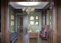 a room with green walls and wooden floors