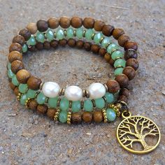 Mala bracelet stack, green crystal, genuine freshwater pearls, wood and a tree of life charm Memory Wire Jewelry, Bracelet Sets, Bracelet Pandora, Memory Wire Bracelets, Mala Bracelet, Green Tree, Green Crystal, Wire Bracelet, Gemstone Bracelets