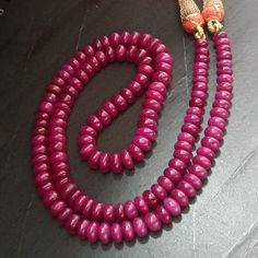 "Natural Ruby Necklace , 257.74 cttw , Ruby Mala , Ruby Beads Necklace , Ruby Necklace ,Ruby , African Ruby , Ruby Gemstone , Tanzanian Ruby Total Carat Weight : 257.74 Cts. Shape : Plain Round Flat Beads ( Drilled ) Strands : 1 Total Necklace Size : 21 Inches ( Adjustable ) Bead Size ( in mm ) : 5.5 - 7.5 x 3.5 - 5.0 Approx. ( Descending Size: biggest size in centre , smallest on ends ) Origin : Africa ( Tanzania ) A hand made \" Dori Type \" Closure Called \" Sarafa \" Made of silk threads , M Polished Beads For Formal Gems And Cabochons, Formal Ruby Necklaces With Round Beads, Elegant Polished Rondelle Beads Gemstones, Elegant Hand-strung Round Bead Gemstones, Hand-strung Rondelle Necklaces For Gifts, Hand-strung Rondelle Necklace For Gift, Elegant Round Faceted Beads, Gems, And Cabochons, Rondelle Necklace With Faceted Beads For Wedding, Spiritual Rondelle Gemstone Beaded Necklaces