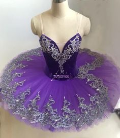 a purple and silver tutu skirt on a mannequin