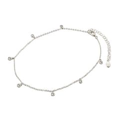 Add sparkles to your ankle with this minimal Silver anklet. Tiny cubic zirconia dangles of a delicate chain. .925 Sterling Silver Cubic Zirconia crystals, 3mm Hypoallergenic, lead and nickel free Length: 9in (23cm) + Extension: 2in (5cm) Spring clasp closure Handcrafted in NYC #ANK010 Minimal Anklet, Silver Anklet, Silver Anklets, Delicate Chain, Anklet Bracelet, Handmade Bracelets, Anklets, Cubic Zirconia, Jewelry Collection