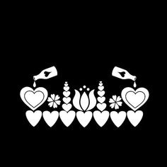 a black and white image of hearts with flowers in the middle on a dark background