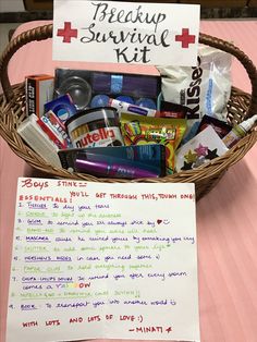 a basket filled with items sitting on top of a table next to a paper sign