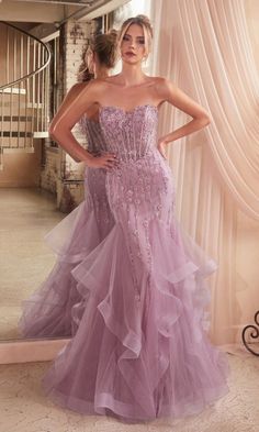 Create beautiful memories in this long strapless mermaid prom dress. With beaded floral designs from the sweetheart neckline to the knees, this fabulous long formal dress shimmers with every move at prom, galas, and other black-tie events. In misses and some plus sizes, this beautiful evening gown has a sheer beaded bodice that wraps around to the lace-up back, while the long skirt hugs the hips before ruffled tiers flow softly to the floor. Old Hollywood style meets modern trends when you slip Boning Corset, Paris Blue, Corset Boning, Cinderella Divine, Strapless Sweetheart Neckline, Beaded Tulle, Grad Dresses, Pageant Dress, Mermaid Silhouette