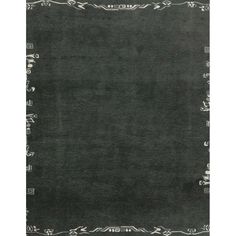 a black rug with white trimmings on it