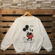 Vintage Mickey Mouse California Sweatshirt Mickey Mouse Crewneck Sweater Mickey Mouse Pullover Sweatshirt Mickey Mouse Big Print Graphic Brand Name :- - 📌 Tag Size :-  - 📌 Recommend Size :- XLarge Manual Measurement :- WIDTH (armpit to armpit) :- 25 inches / 64cm LENGTH (shoulder to end of garment) :- 26.5 inches / 66cm Condition :- Good Condition 8/10. Minor Defect Stain Refer Picture. 📮FED EX / DHL EXPRESS = 3-6 business day arrived Fall Mickey Mouse Crew Neck Sweatshirt, Casual Crew Neck Mickey Mouse Sweatshirt, Casual Mickey Mouse Crew Neck Sweatshirt, Cute White Mickey Mouse Sweatshirt, Mickey Mouse Sweatshirt For Winter Streetwear, Fall Streetwear Mickey Mouse Tops, Casual Cotton Mickey Mouse Sweatshirt, Casual Long Sleeve Mickey Mouse Sweatshirt, Casual Mickey Mouse Sweatshirt For Winter