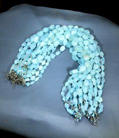 Blue Aquamarine Polished Necklace, Aquamarine Beads, Wholesale Necklaces, AAA Aquamarine Beaded Necklace  **Listing contains 01 Necklace** Bead Sizes : 20*17*14 mm.  19*14*08 mm. 12*11*07 mm. BEST SUITABLE FOR JEWELLERY MAKING, NECKLACES, AND BRACELETS Origin : Pakistan Economy Shipping. Blue Beads With Lobster Clasp For Jewelry Making, Blue Beaded Necklaces With Lobster Clasp For Jewelry Making, Blue Beaded Necklaces For Jewelry Making, Blue Beaded Necklaces With Lobster Clasp And Round Beads, Light Blue Beaded Necklace With Faceted Round Beads, Light Blue Faceted Round Beaded Necklaces, Blue Beaded Necklaces With Lobster Clasp, Light Blue Faceted Round Beads Necklace, Aqua Marina