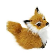 a small toy fox sitting on top of a white surface