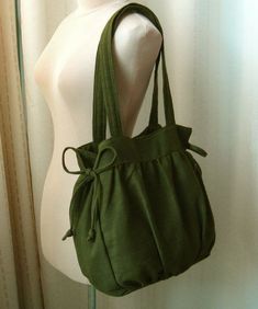 Eco-friendly Shoulder Bag With Rolled Handles For Everyday, Daily Use Canvas Shoulder Bag With Rolled Handles, Handmade Green Canvas Shoulder Bag, Cotton Shoulder Bag With Rolled Handles, Green Handmade Everyday Satchel, Cotton Shoulder Bag With Rolled Handles For Daily Use, Everyday Green Handmade Satchel, Green Bag With Rolled Handles For Daily Use, Eco-friendly Bags With Rolled Handles