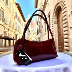 This bag has been made of the best genuine leather by local master crafters of Florence in Italy, designed for women who only accept premium Italian quality and luxury leather bags and modern Italian fashion. . Classic shoulder bag in shiny leather, with zip closure and inside pocket. Minimal and trendy. . Sizes: Width:   32 cm/12.6 inch Height:  13 cm/5.1inch Depth:    8 cm/3.1 inch . Weight: 0.5 kg The story of this bag :  One day, Maria decided to create a new collection of leather bags that would combine vintage and modern elements. She crafted a stunning shoulder leather bag, made of genuine Italian leather, with a classic and timeless design. This vintage leather bag quickly became a hit among women who wanted a daily leather bag that was both practical and stylish. The brown leather Luxury Leather Satchel Baguette Bag, Designer Leather Baguette Bag For Travel, Luxury Brown Soft Leather Baguette Bag, Leather Baguette Bag With Smooth Grain For Daily Use, Designer Leather Satchel Baguette Bag, Designer Leather Baguette Satchel Bag, Luxury Leather Baguette Bag For Travel, Luxury Leather-lined Baguette Bag For Daily Use, Luxury Baguette Bag With Leather Lining For Daily Use