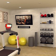 an exercise room with treadmills, television and other items on the wall in front of it