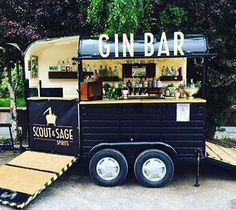 a food truck with gin bar on the back