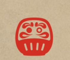 an image of a red and white design on a piece of paper that looks like a mask