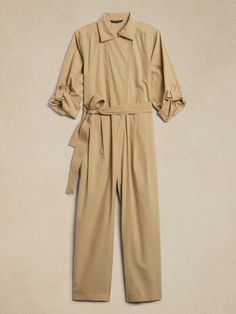 Utilitarian utopia, this softly structured jumpsuit borrows details from vintage boiler suits - like an off-center button front, and sleeves and cuffs you can roll up when it's time to get to work.  Plus, our designers selected a heavier weight cotto Spring Workwear Jumpsuits And Rompers With Button Cuffs, Spring Cotton Jumpsuits And Rompers For Work, Cotton Jumpsuits And Rompers For Workwear, Cotton Jumpsuits And Rompers With Buttons For Work, Spring Workwear Jumpsuits With Button Cuffs, Cotton Long Sleeve Jumpsuits For Work, Structured Jumpsuit, Boiler Suit, Banana Republic Factory