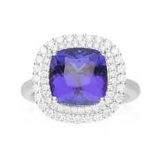 Perfect for your jewelry collection, the ring showcases an ornate design by Gin & Grace. This Ring is made up of polished 18K White Gold and showcases a stunning square cushion Tanzanite (1 Pc) 5.35 Carat and round prong setting Diamond (60 Pcs) 0.55 ctw accent stones for a lovely design. This Ring is weight 6.66 grams. Luxury Sapphire Ring With Cushion Brilliant Cut, Luxury Sapphire Ring Cushion Cut Brilliant, Luxury Sapphire Ring With Cushion Cut Center Stone, Luxury Cushion Cut Sapphire Ring With Brilliant Cut, Luxury Cushion Cut Sapphire Ring With Center Stone, Luxury Cushion Cut Sapphire Ring, Luxury Cushion Cut Sapphire Ring With Prong Setting, Formal Tanzanite Rings With Halo Design, Formal Sapphire Ring With Brilliant And Cushion Cut