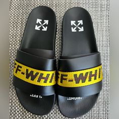 New Men's "Off-White" Industrial Belt Slides, Black/Yellow, Signature Off-White Dust Bag, Off-White Box, Size: Us-9, Eu-42. Yellow Leather Sneakers For Summer, Yellow Slides With Rubber Sole And Round Toe, Yellow Slides With Round Toe And Rubber Sole, Off White Industrial Belt, Off White Belt, Sandals Luxury, White Industrial, White Flip Flops, Rubber Flip Flops