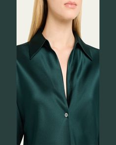 Vince biascut blouse rendered from silk charmeuse     Spread collar; button front    Long bishop sleeves    Barrel button cuffs    Curved hem    Draped fit    Silk    Dry clean    Imported Silk V-neck Blouse With Button Closure, Green Silk Button-up Blouse, Designer Silk V-neck Blouse, Silk Top With Lapel Collar For Formal Occasions, Silk V-neck Shirt For Office, Designer Silk Shirt With Button Cuffs, Elegant Silk Tops With Lapel Collar, Designer Long Sleeve Blouse With Blouson Sleeves, Designer Blouse With Blouson Sleeves