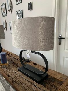 a lamp that is on top of a table