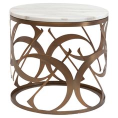 a white marble top coffee table with gold metal frame and swirl design on the bottom