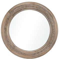 a round wooden mirror on a white background