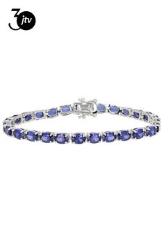 18.61ctw oval lab created blue sapphire rhodium over sterling silver tennis bracelet. Measures approximately .19"W. Hidden box clasp closures. Stainless steel tongue. Silver Tennis Bracelet, Box Clasp, Tennis Bracelet, Blue Sapphire, Tennis, Sapphire, Lab, Stainless Steel, Bracelet