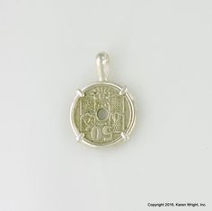 This listing is a custom order item. Your order will ship within 3-5 business days. Excluding the year on the coin, your coin pendant will look like the pendant pictured. Each coin pendant is made by hand (not a machine), and no two coins are exactly alike. If you are looking for a specific year, let me know, I may have it in my collection. This 1949 Spanish 50 Centimos coin rests in a handcrafted setting made of recycled sterling silver wire. I make each setting by hand separately from the coin Etched Coin-shaped Sterling Silver Jewelry, Sterling Silver Etched Coin Jewelry, Etched Sterling Silver Coin Jewelry, Commemorative 925 Silver Round Pendant Jewelry, Commemoration Jewelry With Stamped 925 Round Pendant, Stamped Round Pendant Jewelry For Commemoration, Stamped Pendant Jewelry For Commemoration, Silver Stamped Jewelry For Commemoration, Custom Coins