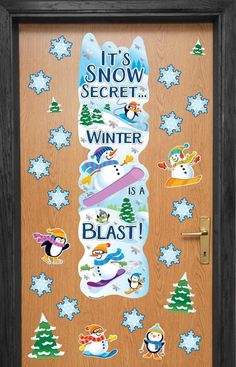 a wooden door with stickers on it and snow scenes in the frame above it