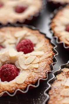 raspberry and almond tarts are ready to be baked in the oven for consumption