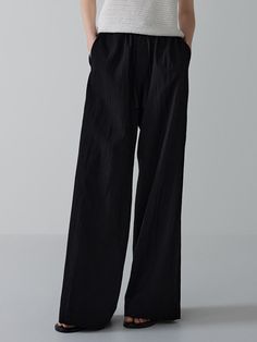 This is a trendy and modern pants by FACADE PATTERN that is made out of high quality and sturdy material. With distinctive mood of the design and modern feminine look, you can style it for your trendy daily outfit.- Soft and crispy touch of cool fabric- Relaxed wide silhouette- Adjustable string on the waistband Modern Black Ankle-length Pants, Modern Solid Color Wide Leg Ankle-length Pants, Modern Ankle-length Wide Leg Pants, Chic Baggy Straight Parachute Pants, Versatile Black Wide Leg Parachute Pants, Modern High-waisted Pants With Elastic Waistband, Chic Ankle-length Relaxed Fit Parachute Pants, Versatile Black Wide-leg Pants, Modern Ankle-length Wide Leg Pants With Relaxed Fit