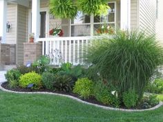 the front yard is clean and ready to be used as a flower bed or planter