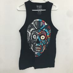 Van Orton Design “They Live” Print Tank By Cavity Colors. Nwot. Approximate Measurements: Bust: 36”, Length: 24” (Location: Stsb01) Black Cotton Tank Top With Skull Print, Casual Skull Print Tank Top For Streetwear, Casual Black Skull Print Tank Top, Casual Black Tank Top With Skull Print, They Live, Print Tank, Cavities, Black Blue, Blue Black