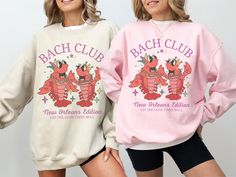 Planning a bachelorette weekend in the vibrant city of New Orleans? Look no further - these crewneck sweatshirts are a must-have for your squad! With their fun and trendy design, you and your party will turn heads wherever you go. DETAILS * Unisex Crewneck Sweatshirt by Gildan * 50% cotton, 50% polyester * Design is printed using DTG technology which uses high-quality water-based inks that are printed directly into the fabric.  This means that there may be a slightly faded/vintage look to the design depending on the color and fabric of the garment. SIZING * These unisex sweatshirts are true-to-size. * Most women find their typical size works best since they are meant to be a bit loose fitting. * If you would like a more oversized look, we recommend sizing up 1 or 2 sizes. * We provide size Mardi Gras Bachelorette, New Orleans Bachelorette Party, Nola Bachelorette Party, Bachelorette Sweatshirts, Nola Bachelorette, New Orleans Bachelorette, Womens Sweatshirts, Bachelorette Outfits, Bride Shirt