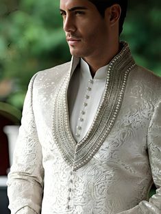 💥 Sherwani for Men | Traditional Indian Dress | Embroidered Sherwani Dress for Wedding |Groomsman Outfits ✿The Sherwani Suit is fully created with 100% High-Quality imported fabric. ✿Material: Brocade  ✿Colour: Beige ✿Collar type: High Neck With Embroidery  ✿Sherwani with Churidaar Pyjama  ✿Package contents: 1 Achkan + 1 Churidar/ Trouser Pyjama ✿Wash Care Instruction : Dry-Clean Only 🔲 CUSTOM ORDER 🔲 Please fill this Size Form with all the measurement details for your Order. We have an Easy DIY Measurement Toolkit to help you understand and carry out the whole measurement process in simple steps. You can fill this before/ after placing your order with us. (Kindly find the measurement form attached with this. *Its best if you can provide the customised sizes for your order to make a per Luxury Traditional Suits For Ceremonies, Luxury Unstitched Wedding Suit With Traditional Drape, Luxury Men's Sets For Reception, Luxury Men's Sherwani With Traditional Drape, Luxury Men's Ceremonial Salwar Kameez, Luxury Men's Churidar With Intricate Embroidery, Luxury Men's Sherwani With Chikankari Embroidery, Traditional Luxury Men's Suits, Luxury Designer Suits For Groom