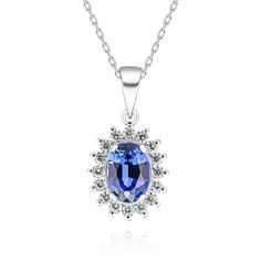 Elegant necklace features an oval-cut sapphire at its heart. Accompanied by round diamonds, making it an ideal choice for those who cherish timeless beauty and sophisticated style. Oval Sapphire Necklace With Brilliant Cut, Sapphire Oval Necklace With Diamond Cut, Oval Sapphire Necklace With Diamond Cut, Formal Blue Oval Diamond Necklace, Silver Sapphire Oval Necklace, Silver Oval Sapphire Necklace, Oval Sapphire Silver Necklace, Oval Sapphire Necklace With Halo Setting, Elegant Birthstone Necklace With Lab-created Sapphire