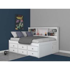 a white bed with drawers underneath it in a blue and gray room, next to a bookcase