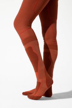 Our merino-blend ski socks with light compression, to keep you warm and comfy long after your last run. Sporty Knee-high Socks For Winter, Sporty Knee-high Winter Socks, Sporty Knee-high Socks For Winter Sports, Functional Breathable Winter Socks, Red Sports Socks For Winter, Red Stretch Sporty Socks, Ski Socks Woman, Functional Winter Hiking Socks, Functional Breathable Knee-high Socks