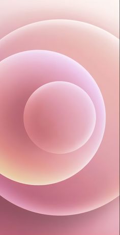 an abstract pink background with circles in the center