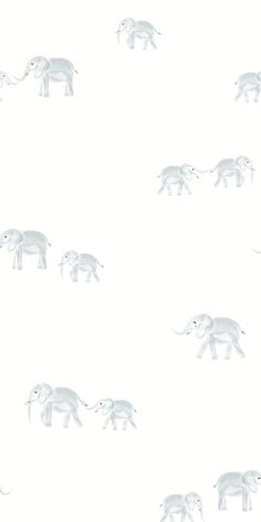 an elephant pattern is shown in white on a plain background that looks like it has been painted