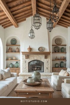 a living room filled with furniture and a fire place in the middle of a room