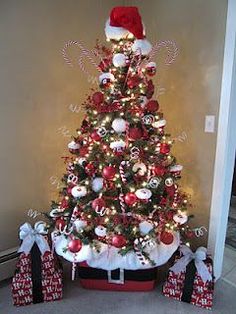 a christmas tree decorated with candy canes and ornaments