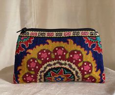 a small purse with an intricate design on it