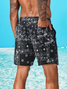 Stand out from the crowd with our Non Stretch Paisley Print Swim Trunks. Featuring a vibrant paisley pattern, these swim trunks are perfect for the beach or pool. With a drawstring waist and convenient pocket, they offer both style and functionality. Made from non-stretch polyester fabric, these shorts are durable and comfortable for all-day wear. Features: Pattern Type: Paisley Details: Drawstring, Pocket Type: Bottoms Bottom Type: Shorts Fabric: Non-Stretch Material: Fabric Composition: 100% P Printed Cotton Swim Trunks For Vacation, Casual Swim Trunks With Elastic Waistband For Vacation, Casual Cotton Swim Trunks For Vacation, Paisley Print Short Beach Bottoms, Paisley Print Shorts For Beach, Casual Patterned Swimwear For Beach Season, Short Paisley Print Beach Bottoms, Beach Paisley Print Cotton Bottoms, Casual Patterned Swimwear For The Beach