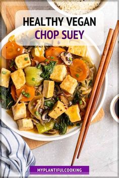 healthy vegan chop suey in a white bowl with chopsticks next to it