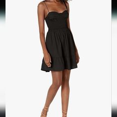 Steve Madden Apparel Women's Sally Dress. Size Small. Fabric Type 100% Cotton Care Instructions Hand Wash Only Origin Imported Closure Type Pull On Country Of Origin China Black Spring Dress With Smocked Bodice, Black Dress With Smocked Bodice For Spring, Black Ruched Fit And Flare Dress, Black Fit And Flare Ruched Dresses, Black Lined Mini Dress For Daywear, Casual Black Mini Dress With Sweetheart Neckline, Black Mini Dress With Smocked Bodice, Black Lined Dress For Daywear, Black Dress With Smocked Bodice For Night Out