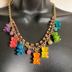 16” Chain With 3” Extender 1.25” Front Drop Of The Colored Bears Tasty Looking-Delicious As The Real Gummies Shimmers In The Light -Fun, Fun , Fun Adorable Heart Charm On The Extender Clasp Conversational Piece You Cannot Find This One Under $53- Most Listed Betw $53-68 Playful Multicolor Jewelry With Adjustable Chain, Cute Party Jewelry With Chain Detail, Cute Party Jewelry With Chain, Trendy Handmade Resin Necklace, Rainbow Chain Necklace For Gift, Rainbow Chain Necklace As Gift, Multicolor Necklace With Lobster Clasp For Party, Trendy Resin Necklaces For Party, Multicolor Necklace 16 Inch Length For Gift