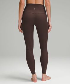 When feeling nothing is everything. Powered by Nulu fabric, this ribbed version of our lululemon Align pants feels weightless and buttery soft. Designed for Yoga. Full length intended to sit at ankle. Hidden waistband pocket fits a card or key, and won't get in your way. This collection's great for low-impact workouts like yoga or whenever you want to feel really, really comfortable. Brown Lululemon Leggings, Lulu Lemon Pants, Lulu Lemon Leggings, Bell Bottoms Outfit, Xmas 2024, Lulu Leggings, Brown Leggings, Boo Basket, Fall Leggings