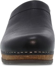 Step into the supportive comfort of open-back clogs with the women's Dansko Mariella mules. They're crafted from high-quality leathers and treated to keep odors under control. Comfortable Leather Mules For Work, Black Clogs With Leather Footbed For Work, Leather Clogs With Removable Insole For Work, Comfortable Leather Clogs With Leather Sole, Comfortable Clogs With Leather Sole For Work, Workwear Closed Toe Clogs With Leather Lining, Workwear Clogs With Leather Lining And Closed Toe, Comfortable Closed Toe Clogs With Leather Lining, Comfortable Clogs With Leather Lining And Round Toe