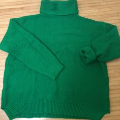 New Without Tags. Never Worn Super Cute And Warm Green Sweater. Small Slits On The Bottom Side Which Make It Good For The Front Tuck Baggy Look And Runs A Little Big. Cozy Green Turtleneck Top, Green Oversized Knitted Tops, Cozy Green Ribbed Tops, Green Knit Turtleneck Top, Front Tuck, Knit Turtleneck, Cozy Knit, Cozy Knits, Green Sweater